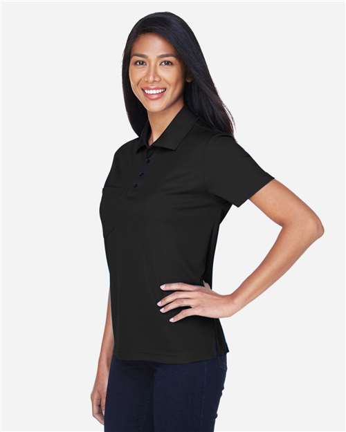 Core 365 78181P Women's Origin Performance Piqué Polo with Pocket - Black - model side