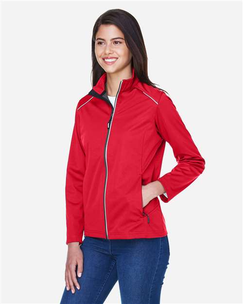 Core 365 CE708W Women's Techno Lite Three-Layer Knit Tech-Shell - Classic Red - model side