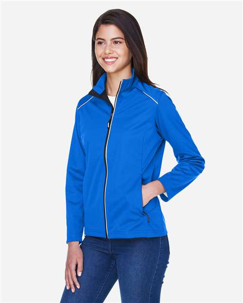 Core 365 CE708W Women's Techno Lite Three-Layer Knit Tech-Shell - True Royal - model side
