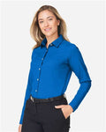 Devon & Jones DG505W Women's CrownLux Performance Spencer Poplin Dress Shirt - French Blue Melange - model side