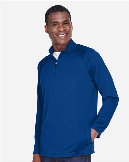 Devon & Jones DG440 Men's Stretch Tech-Shell Compass Quarter-Zip Pullover - True Royal - model side