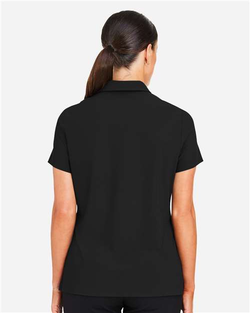 Devon & Jones DG110W Women's CrownLux Performance Windsor Welded Polo - Black - model back