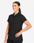 Devon & Jones DG110W Women's CrownLux Performance Windsor Welded Polo - Black - model side