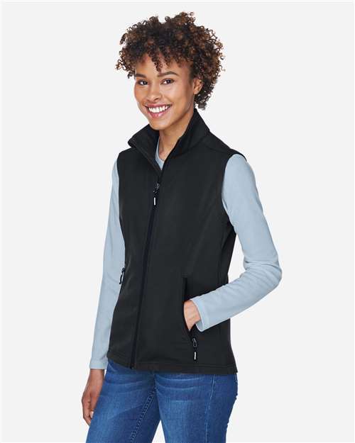 Core 365 CE701W Women's Cruise Two-Layer Fleece Bonded Soft Shell Vest - Black - model side
