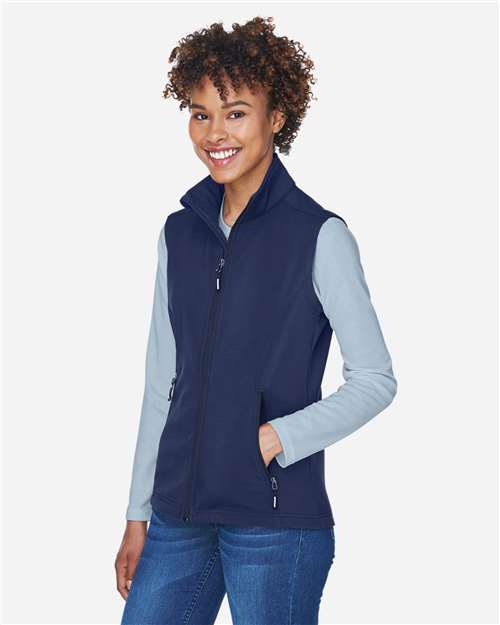 Core 365 CE701W Women's Cruise Two-Layer Fleece Bonded Soft Shell Vest - Classic Navy - model side