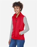 Core 365 CE701W Women's Cruise Two-Layer Fleece Bonded Soft Shell Vest - Classic Red - model side