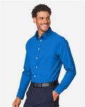 Devon & Jones DG505 Men's CrownLux Performance Spencer Poplin Dress Shirt - French Blue Melange - model side