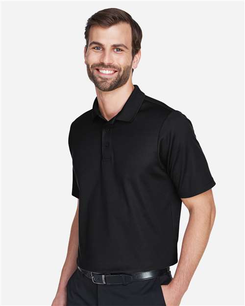 Devon & Jones DG20T Men's Tall CrownLux Performance Plaited Polo - Black - model side