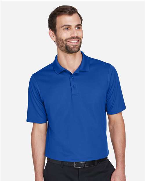 Devon & Jones DG20T Men's Tall CrownLux Performance Plaited Polo - True Royal - model front