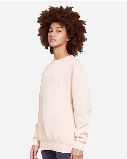Lane Seven LS14004 Unisex Premium Crewneck Sweatshirt - Pale Pink - model side