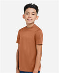 Team 365 TT15Y Youth Zone Performance Mesh T-Shirt - Sport Burnt Orange - model side