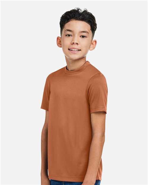 Team 365 TT15Y Youth Zone Performance Mesh T-Shirt - Sport Burnt Orange - model side