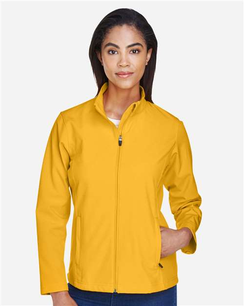 Team 365 TT80W Women's Leader Soft Shell Jacket - Sport Athletic Gold - model front
