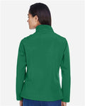 Team 365 TT80W Women's Leader Soft Shell Jacket - Sport Kelly - model back