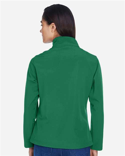 Team 365 TT80W Women's Leader Soft Shell Jacket - Sport Kelly - model back