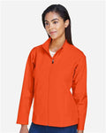 Team 365 TT80W Women's Leader Soft Shell Jacket - Sport Orange - model side