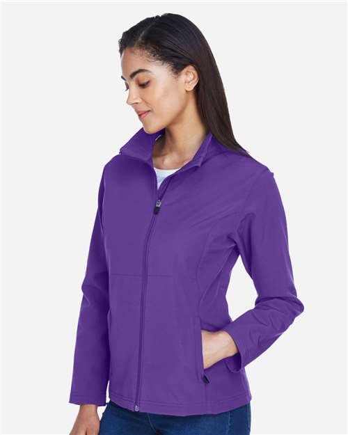 Team 365 TT80W Women's Leader Soft Shell Jacket - Sport Purple - model side