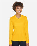 Team 365 TT11WL Women's Zone Performance Long Sleeve T-Shirt - Sport Athletic Gold - model front