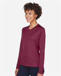 Team 365 TT11WL Women's Zone Performance Long Sleeve T-Shirt - Sport Maroon - model side
