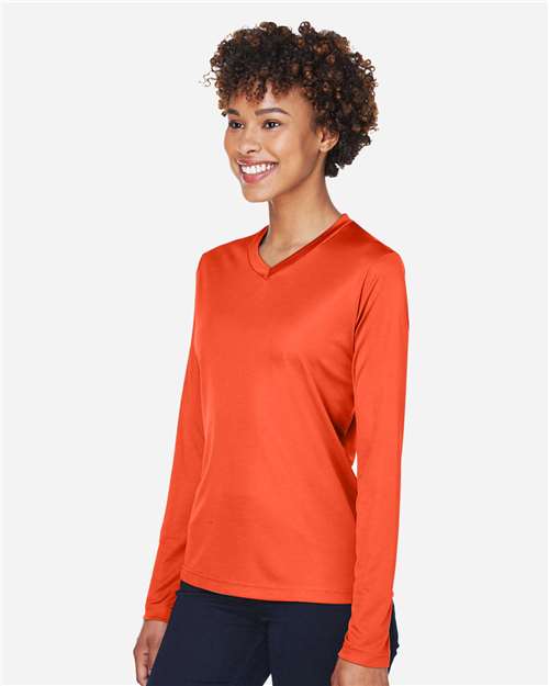 Team 365 TT11WL Women's Zone Performance Long Sleeve T-Shirt - Sport Orange - model side