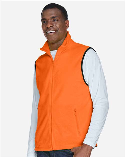 Harriton M985 Unisex Fleece Full-Zip Vest - Safety Orange - model side