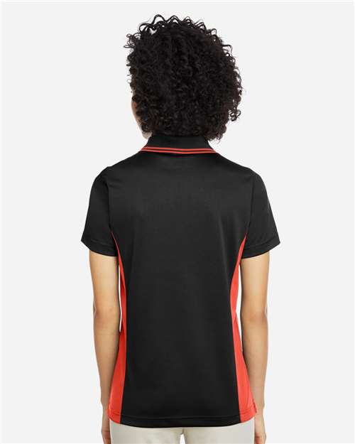 Harriton M386W Women's Flash Snag Protection Plus IL Colorblock Polo - Black/ Team Orange - model back