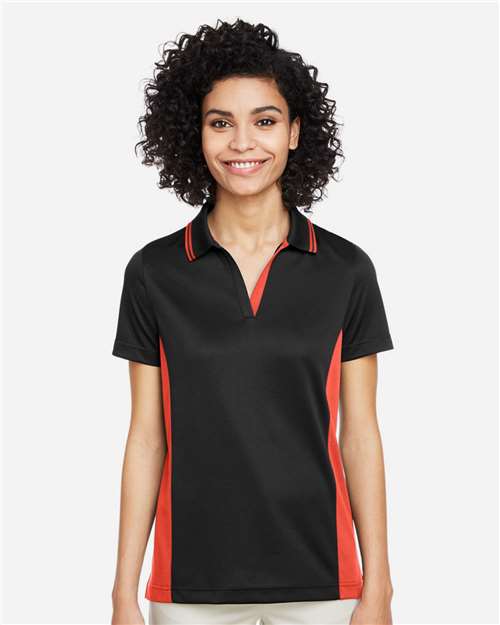 Harriton M386W Women's Flash Snag Protection Plus IL Colorblock Polo - Black/ Team Orange - model front