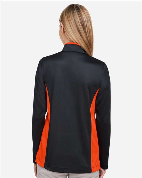 Harriton M786W Women's Flash Snag Protection Plus IL Colorblock Quarter-Zip Pullover - Black/ Team Orange - model back