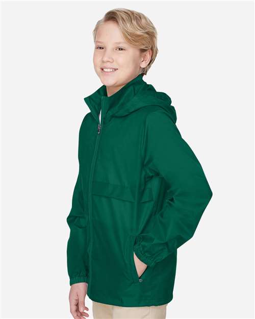 Team 365 TT73Y Youth Zone Protect Lightweight Jacket - Sport Forest - model side