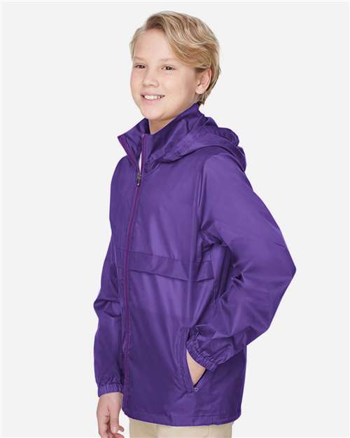 Team 365 TT73Y Youth Zone Protect Lightweight Jacket - Sport Purple - model side