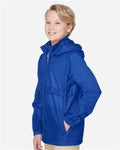 Team 365 TT73Y Youth Zone Protect Lightweight Jacket - Sport Royal - model side