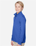 Team 365 TT31HY Youth Zone Sonic Heather Performance Quarter-Zip Pullover - Sport Royal Heather - model side