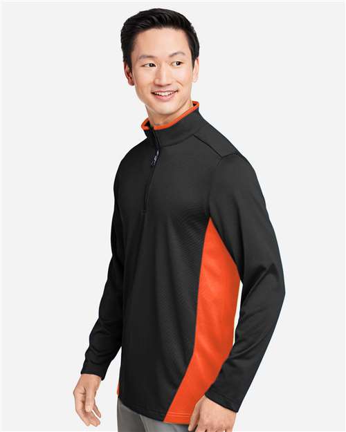 Harriton M786 Men's Flash Snag Protection Plus IL Colorblock Quarter-Zip Pullover - Black/ Team Orange - model side