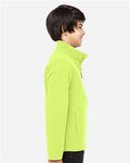 Team 365 TT80Y Youth Leader Soft Shell Jacket - Safety Yellow - model side
