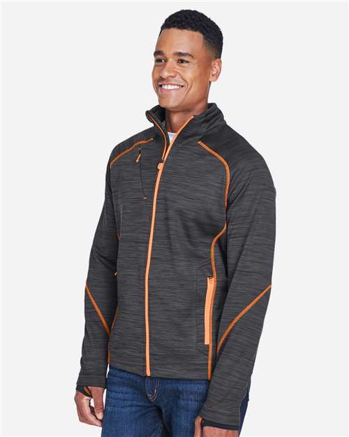 North End 88697 Men's Flux Mélange Bonded Fleece Jacket - Carbon/ Orange Soda - model side