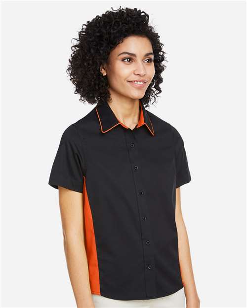 Harriton M586W Women's Flash IL Colorblock Shirt - Black/ Team Orange - model side
