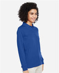 Harriton M348LW Women's Advantage Snag Protection Plus IL Long Sleeve Polo - True Royal - model side