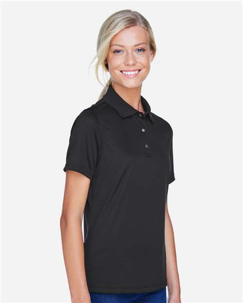 Harriton M345W Women's Advantage Snag Protection Plus IL Snap Placket Polo - Black - model side