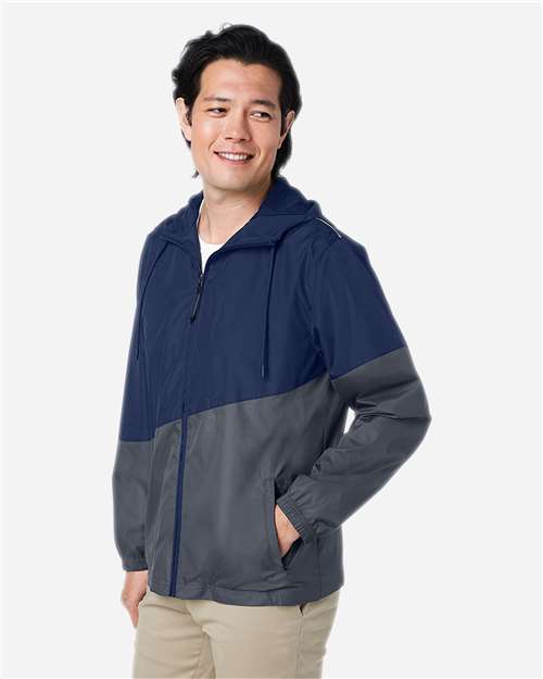 Core 365 CE710 Unisex Techno Lite Colorblock Windbreaker - Classic Navy Heather/ Carbon - model side