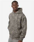 Independent Trading Co. IND330BLV Unisex Boulevard Heavyweight Hooded Sweatshirt - Deadwood Tree Camo - model side