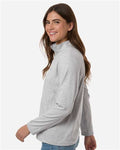 HUK H6130024 Women's Coldfront+ Quarter-Zip Pullover - Harbor Mist Heather - model side