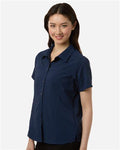 Core 365 CE520W Women's UltraUVP Shoreline Short Sleeve Staff Shirt - Classic Navy - model side