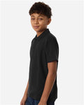 Core 365 CE106Y Youth Resolve CVC Performance Pique Polo - Black - model side