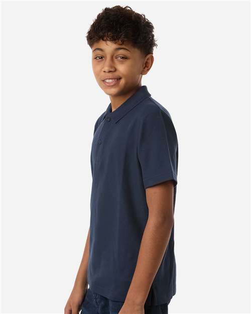 Core 365 CE106Y Youth Resolve CVC Performance Pique Polo - Classic Navy - model side