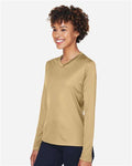 Team 365 TT11WL Women's Zone Performance Long Sleeve T-Shirt - Sport Vegas Gold - model side