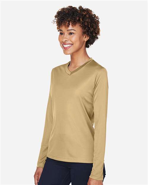 Team 365 TT11WL Women's Zone Performance Long Sleeve T-Shirt - Sport Vegas Gold - model side