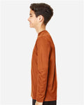 Team 365 TT11YL Youth Zone Performance Long Sleeve T-Shirt - Sport Burnt Orange - model side
