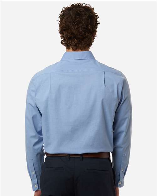 Devon & Jones DG505 Men's CrownLux Performance Spencer Poplin Dress Shirt - Light Blue Melange - model back