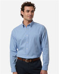 Devon & Jones DG505 Men's CrownLux Performance Spencer Poplin Dress Shirt - Light Blue Melange - model front