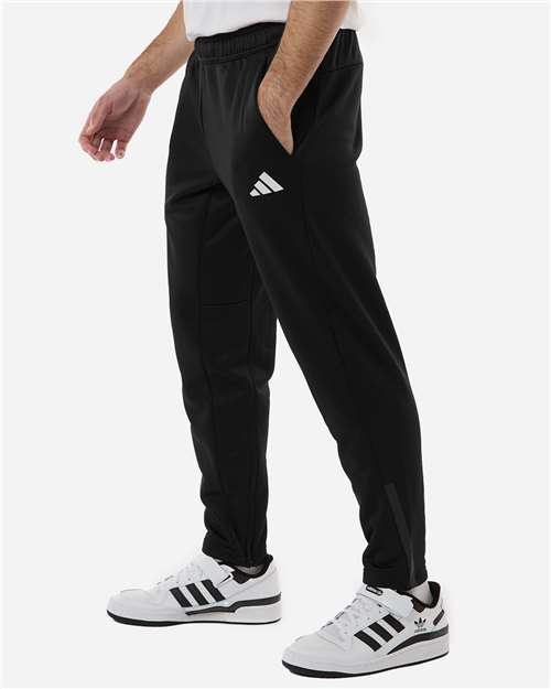 Adidas AT218 Men's Game & Go Fleece 3-Bar Sweatpants - Black - model side
